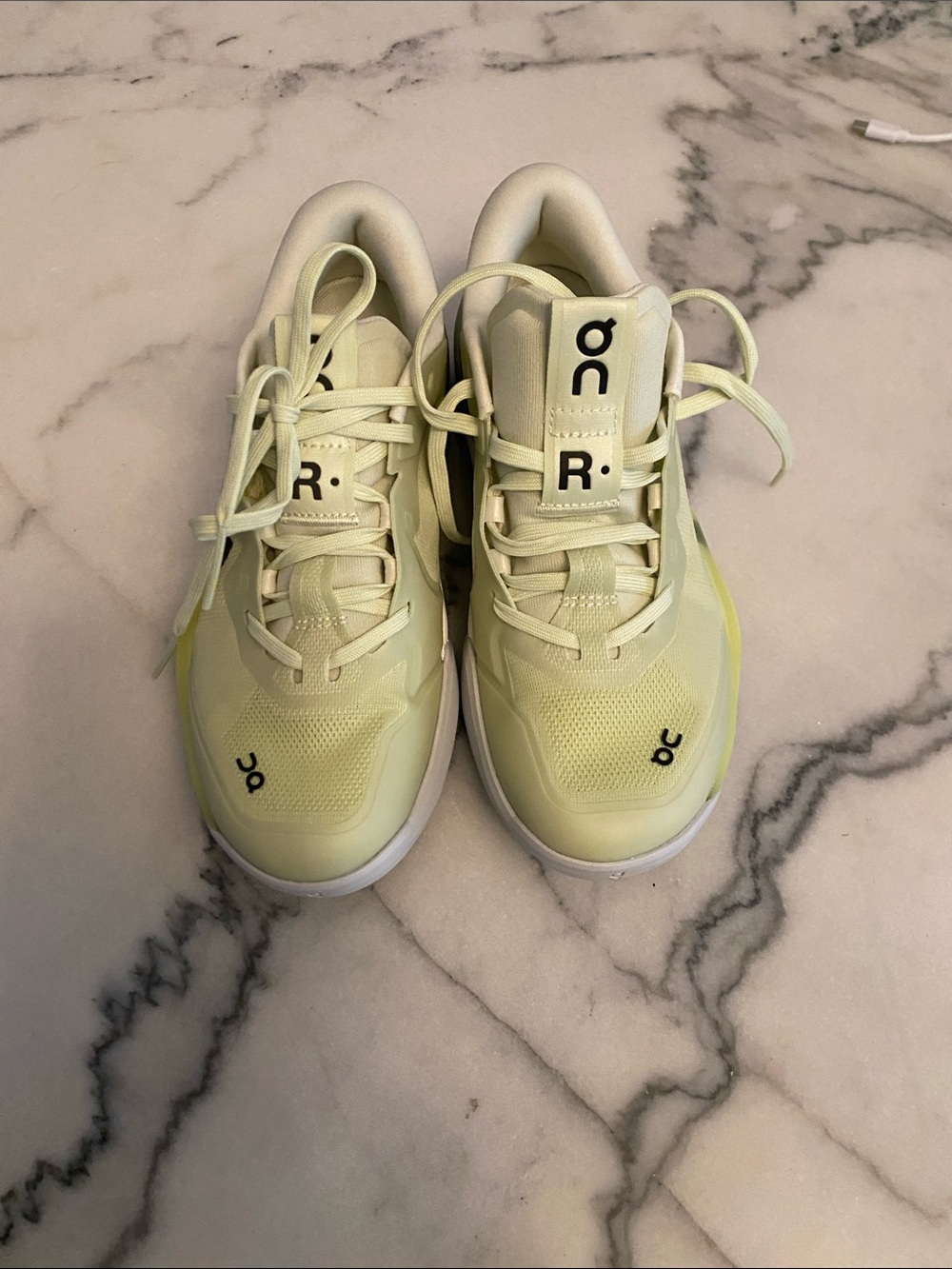 On Running Women’s Pale Yellow Lace-Up Sneakers